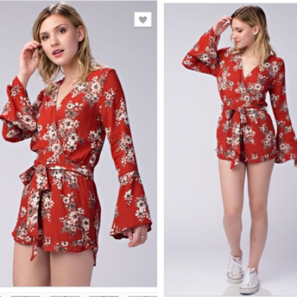 NEW. Floral romper, long bell sleeves.